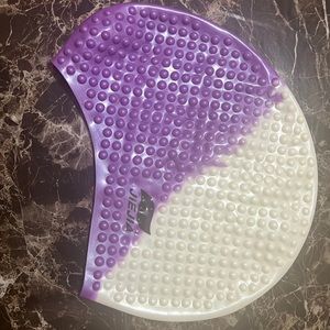 A swimming cap to protect your hair while enjoying summer.